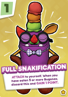 Bugsnax card game card. Image: Floofty smirking. Their limbs, nose, and the top of their head have been replaced by food, and they also have food horns. Text: "FULL SNAKIFICATION: ATTACH to yourself. When you have eaten 5 or more Bugsnax, discard this to GAIN 1 POINT."
