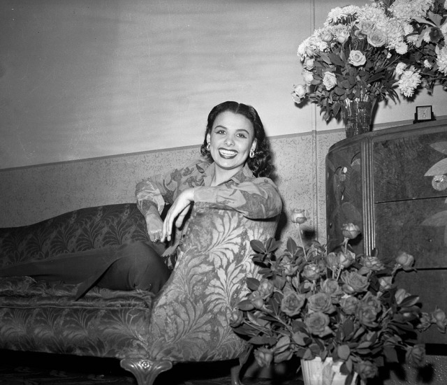 Lena Horne photographed by Charles Harris backstage at Stanley Theatre in Pittsburgh, 1944.