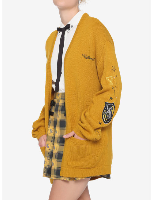 Hogwarts house fashions (part one) found at Hot Topic.RavenclawCardiganZip up robe hoodiePlaid skirt