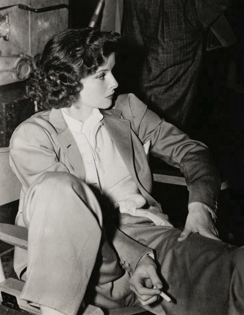 summers-in-hollywood:Katharine Hepburn smoking on the set of Bringing Up Baby, 1938