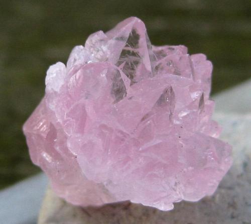 seyelle:  Lovely rose quartz crystals. I wish my camera and I could agree on better quality photos of this one. 