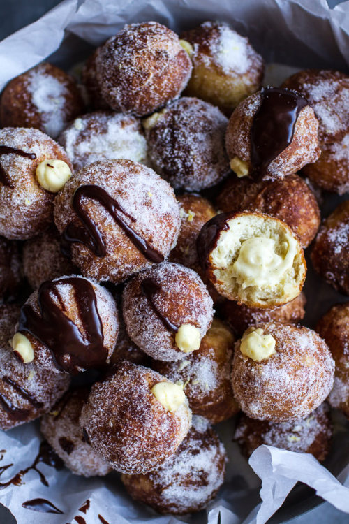 sweetoothgirl:Vanilla Cream Filled Cabernet Hot Chocolate Snowball Doughnuts 