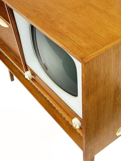midcenturymodernfreak:  1962 Czech Television Case | Beech and Ash Wood Construction with Cream-Colored Resin Dials This unit only receives a signal broadcast on a UHF frequency that was used by the government for broadcasting during the Communist era