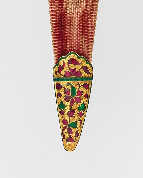 Dagger and SheathDate: ca. 1605–1627Culture: Indian, MughalMedium: Steel, gold, ruby, emerald, wood,