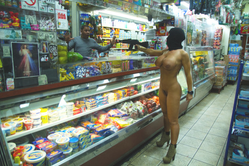 lunarynth:  flynesseffect:  This Bodega in the Bronx was getting robbed by a naked lady. I forgot what I went in there to buy. Left with this awesome photo.   still not over the greatness of this photo 