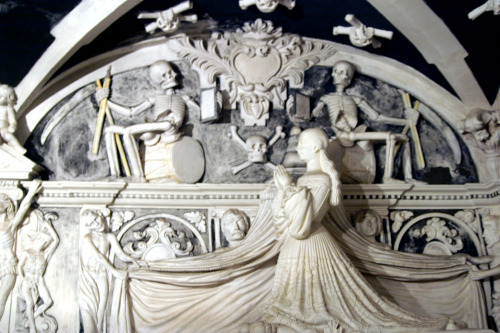 Praying statue of a man and woman from the Crypt of the sanctuary of Santa Maria de la Victoria