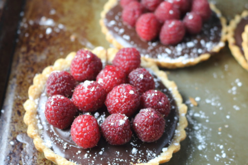 lustingfood:Dark Chocolate Ganache + Raspberry Tarts