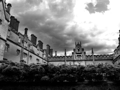 Clouds scowled over the College, dark-faced as invigilators by an exam hall door …