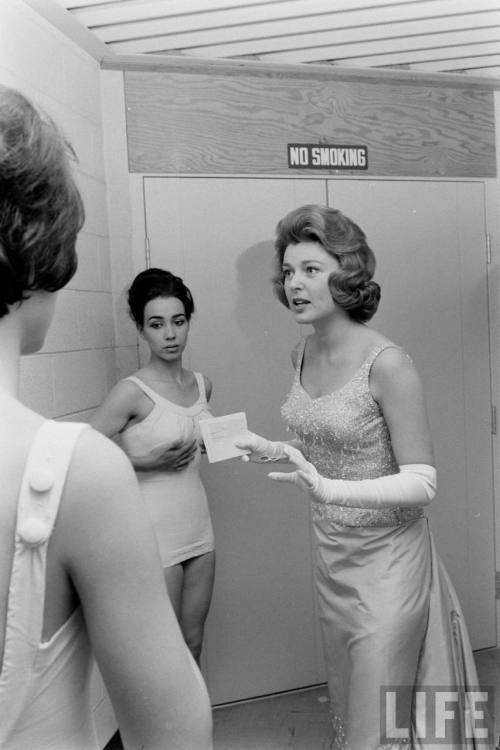 Last minute instructions before the swimsuit portion of the competition(Francis Miller. 1963)