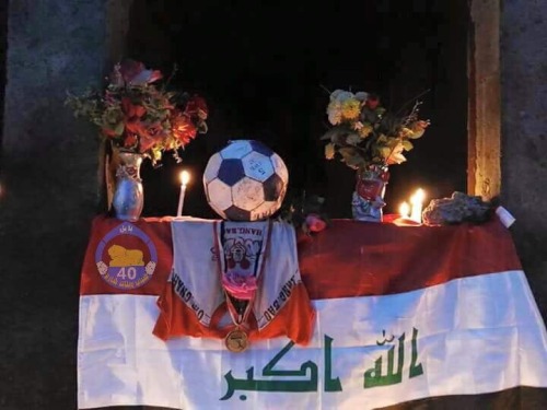 Tributes placed for the Iraqi children and teenagers who lost their lives playing football a few day