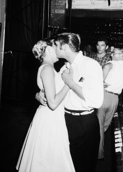 vinceveretts:  Rock singer Elvis Presley tenderly embracing &amp; kissing the cheek of a female admirer backstage before his concert. (Photo by Robert W. Kelley//Time Life Pictures) 