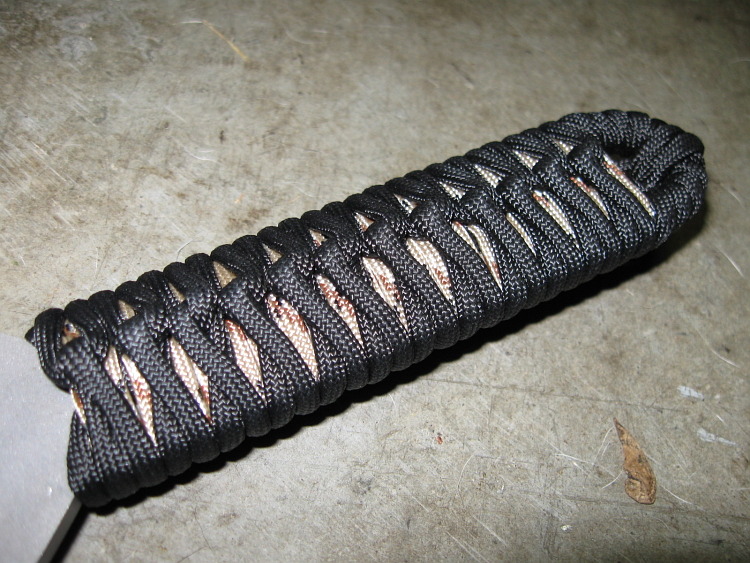 gunrunnerhell:  Garrison Fighting KnifeAn oddly shaped knife, using the term loosely,