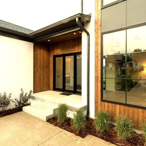 Contemporary Exterior In LouisvilleTrendy White Two-story Brick Exterior Home Photo