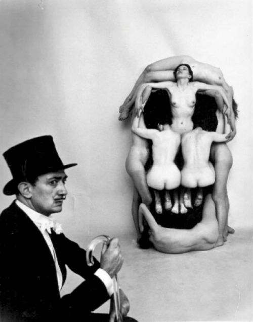 dappledwithshadow:Salvador Dalí posing naked female models to form a human skull entitled “In Volupt