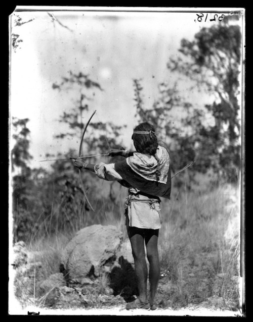 Native man shooting a bow and arrow, Mexico circa 1890s