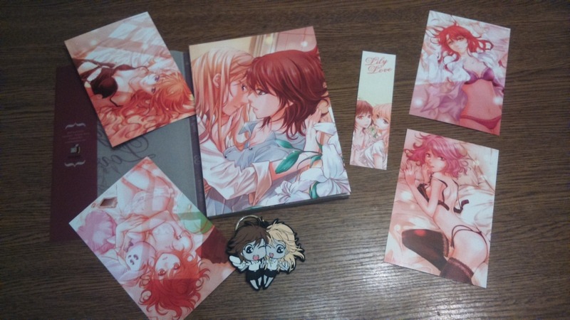 Another volume and postcards from Lily Love in my collection :3And I love this keychain