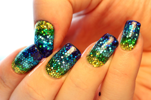 polishallthenails:Sure, there’s nearly a thousand individually placed pieces of glitter on this merm