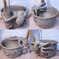 earthwoolfire:  Octopus yarn bowl. Unfired. This bowl has the additional feature of a knitting needle/crochet hook holder in the form of a hollow log that the Octopus has in its grip. The Octopus is climbing over the top of the bowl and several of its