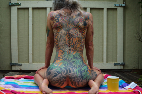 theburninglotus:  Lotsa ink, feet and hair. And ass. There’s that ass. 