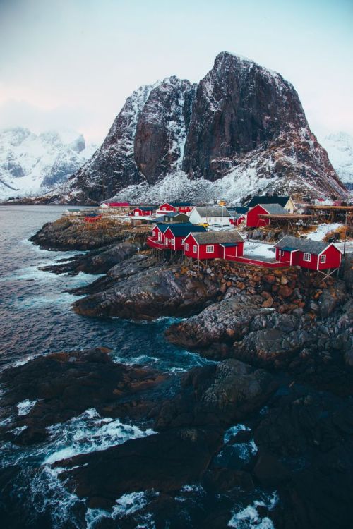 Little red houses by the sea.source