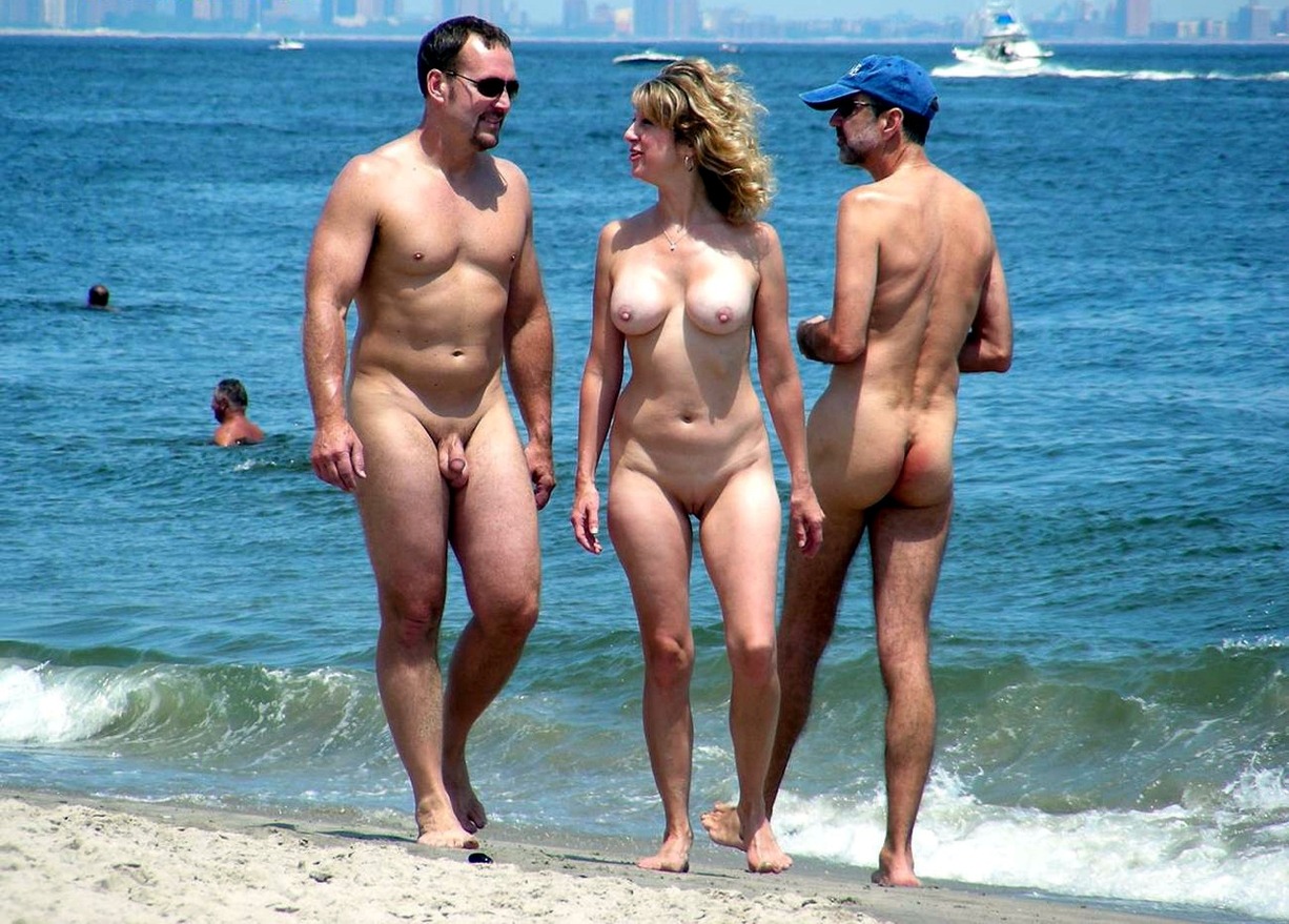 Nudist family at beach