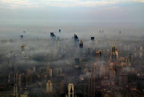 Shanghai From A Crane.Crane operator by day, aerial photographer by day too. Just glancing at the 