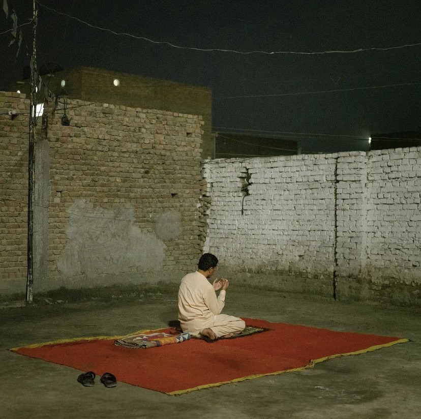 rrrrerrr-deactivated20220531:A man performs evning prayers in the city center Jacobabad