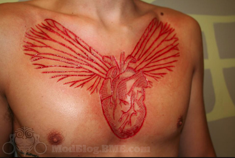 moshita:  heart scarification Richard Deffin Ivey | Instagram    