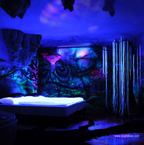 asylum-art:  Artist Bogi Fabian Creates Hidden Bedroom Murals Using Glowing UV Paints Vienna-based artist Bogi Fabian. Many of her creations look like completely normal bedrooms until you flip on a black light. Suddenly you’re floating in the middle