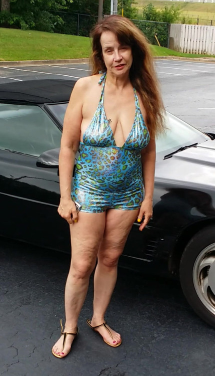 Liz outside hotel after being filled full of Cum from being the life of a all night party.