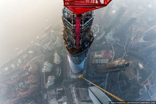 fergyness:  cjwho:  Rooftoppers Secretly Climb 650-Meter-High Crane in Shanghai by Vitaly Raskalov and Vadim Makhorov | via Russian photographers and adrenaline junkies Vitaly Raskalov and Vadim Makhorov, who are no strangers to traveling to the world’s