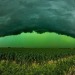 kaijuno:kaijuno:This was in Sioux Falls South Dakota! The green sky is caused by large hail stones within the storm refracting back green light to the observer.More pics from that day