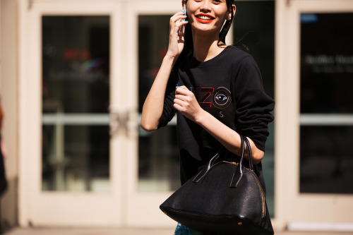 Model Ming Xi during NYFW. For Refinery 29.