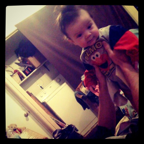 Baby Xander being help by his father Kyle !!! #nephew