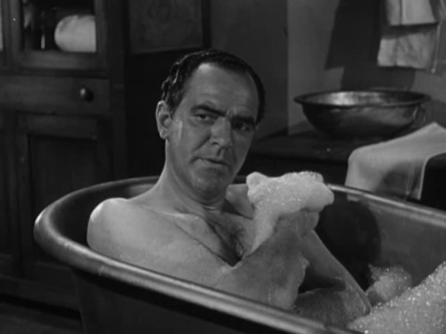 Bronco S01E19 part 2 of 2Bronco (Ty Hardin) and Ab Walker (Karl Weber) have a soak in the tub.  