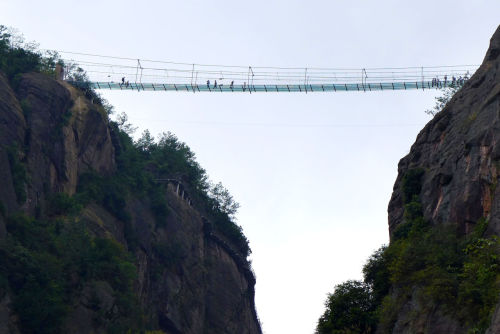 This utterly terrifying glass bridge just opened in China  www.popularmechanics.com/tech