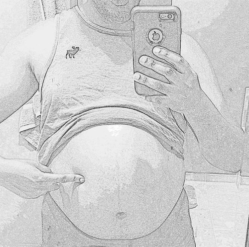 mpregdude87: Its amazing how tight the skin has gotten on this swollen gut of mine!