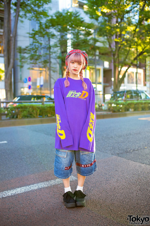 Hiyori on the street in Harajuku wearing a HEIHEI Harajuku x Initial D long sleeve shirt with a HEIH