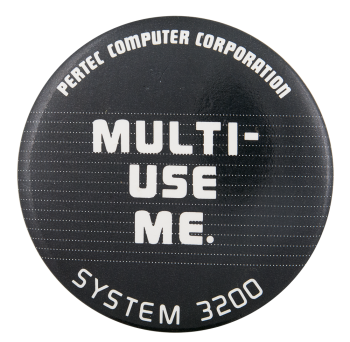 a black pin with white text reading 'pertec computer corporation, MULTI-USE ME, SYSTEM 3200'