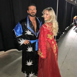 mitchtheficus:  I love how charlotte’s robe makes me think “royalty” and bobby roode’s makes me think “couch potato who likes sparkles”