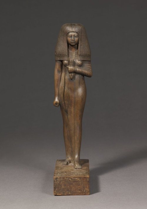 Statuette of Lady TjuyuThe statuette of Tuy is carved from two species of wood that the Egyptians im