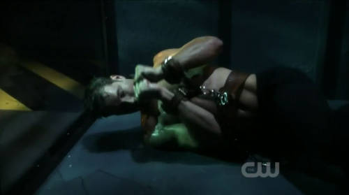 boundhung:  Justin Hartley (as Green Arrow) in the dungeon. Smooth blond boy, captured and ready for use. 