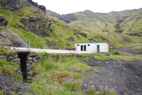 Around a couple of hills and hidden deep in a little mountain niche is one of the coolest Icelandic 