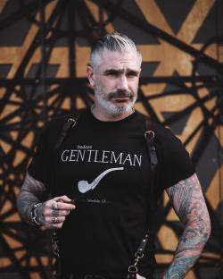 sheehanandcompany: Today I feel like a badass gentleman! Thanks for all of my birthday wishes and enjoy 20% off of leather accessories knits and tees PROMOCODE gentleman #suspenders #tshirt #fashion #menswear #badass #madeinusa #beard #beardedmen #holster