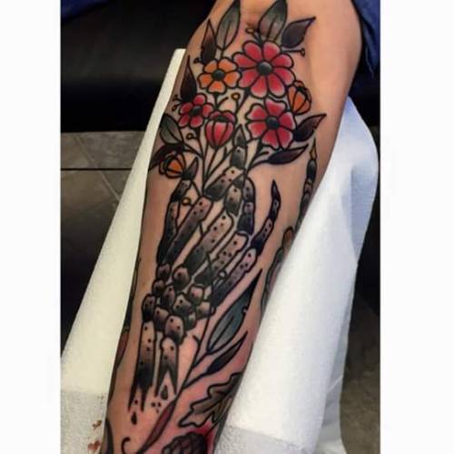 girl with a tattoo on her hands holding a bouquet of flowers Stock Photo   Alamy