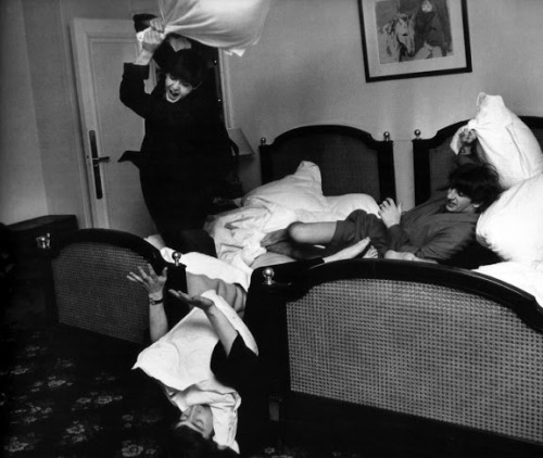 the-cosmic-empire: The Beatles having a pillow fight at The George V Hotel, Paris, c. 27th January 1