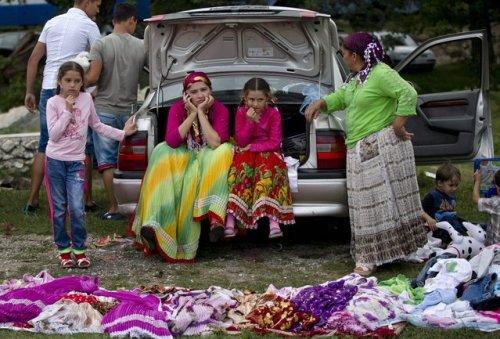 iophiels:“Romanian Romas Celebrate the Birth of the Virgin Mary“Photo by Vadim Ghirda/AP