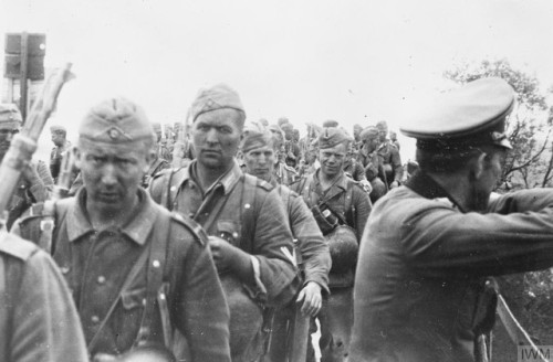 German troops of Army Group North cross a bridge near the city ofJonava (Lithuania, June 1941).  The