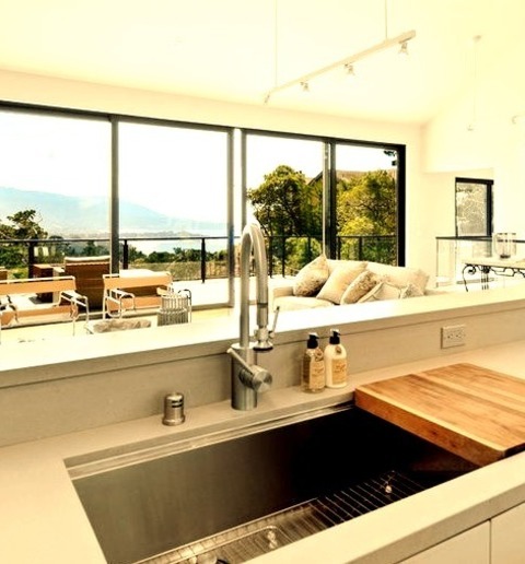 Kitchen PantryInspiration For A Large, Modern Kitchen Pantry Remodel With A Medium-toned Wood Floor,