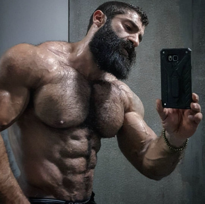 hairydadsandmuscle:Love to suck those big, hairy tits. And his cock. And his butt hole. His crack must be packed full of fur.  Doumit Ghanem  